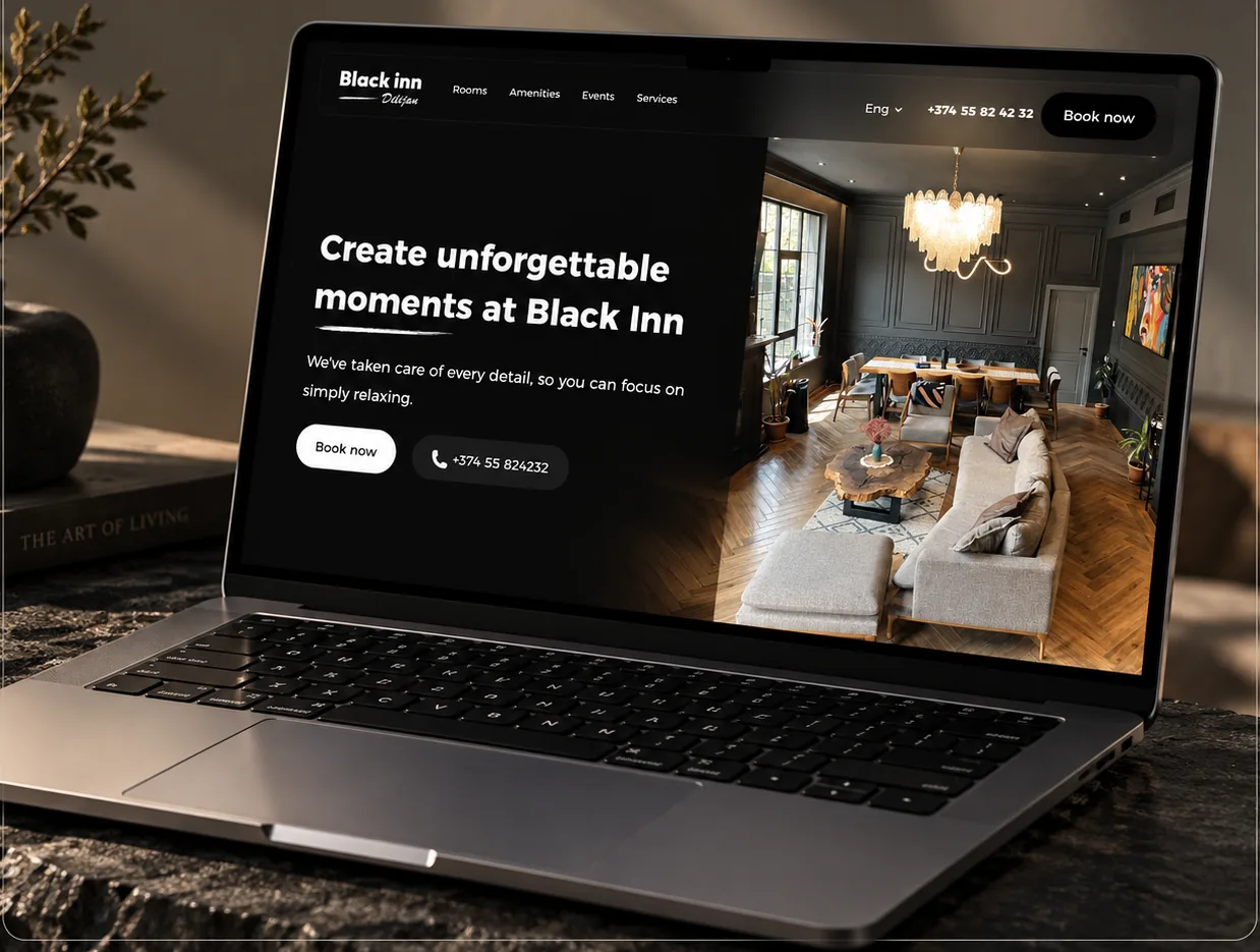 Black Inn website homepage shown on a laptop